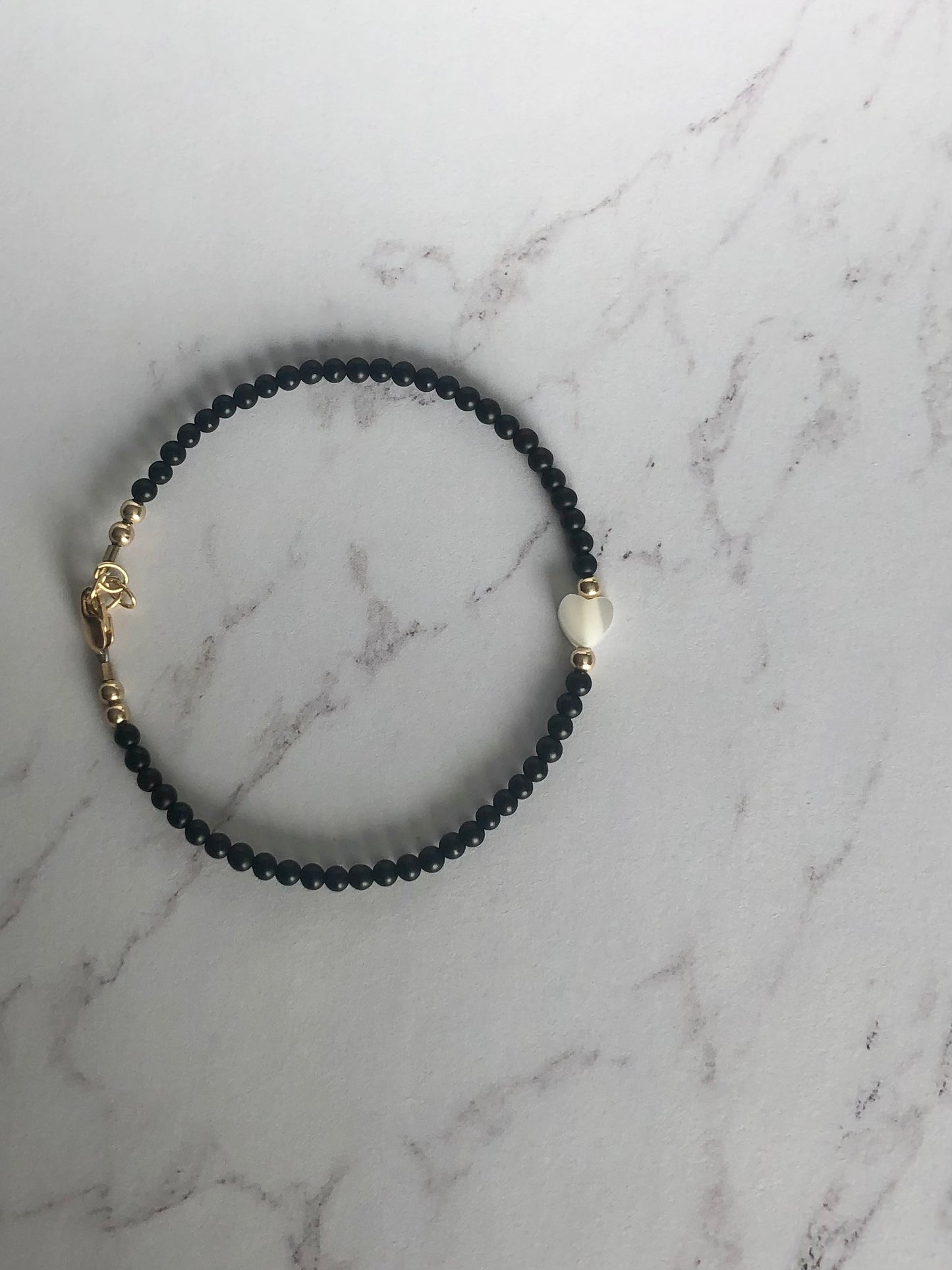 Solitaire Pearl Heart Bracelet.