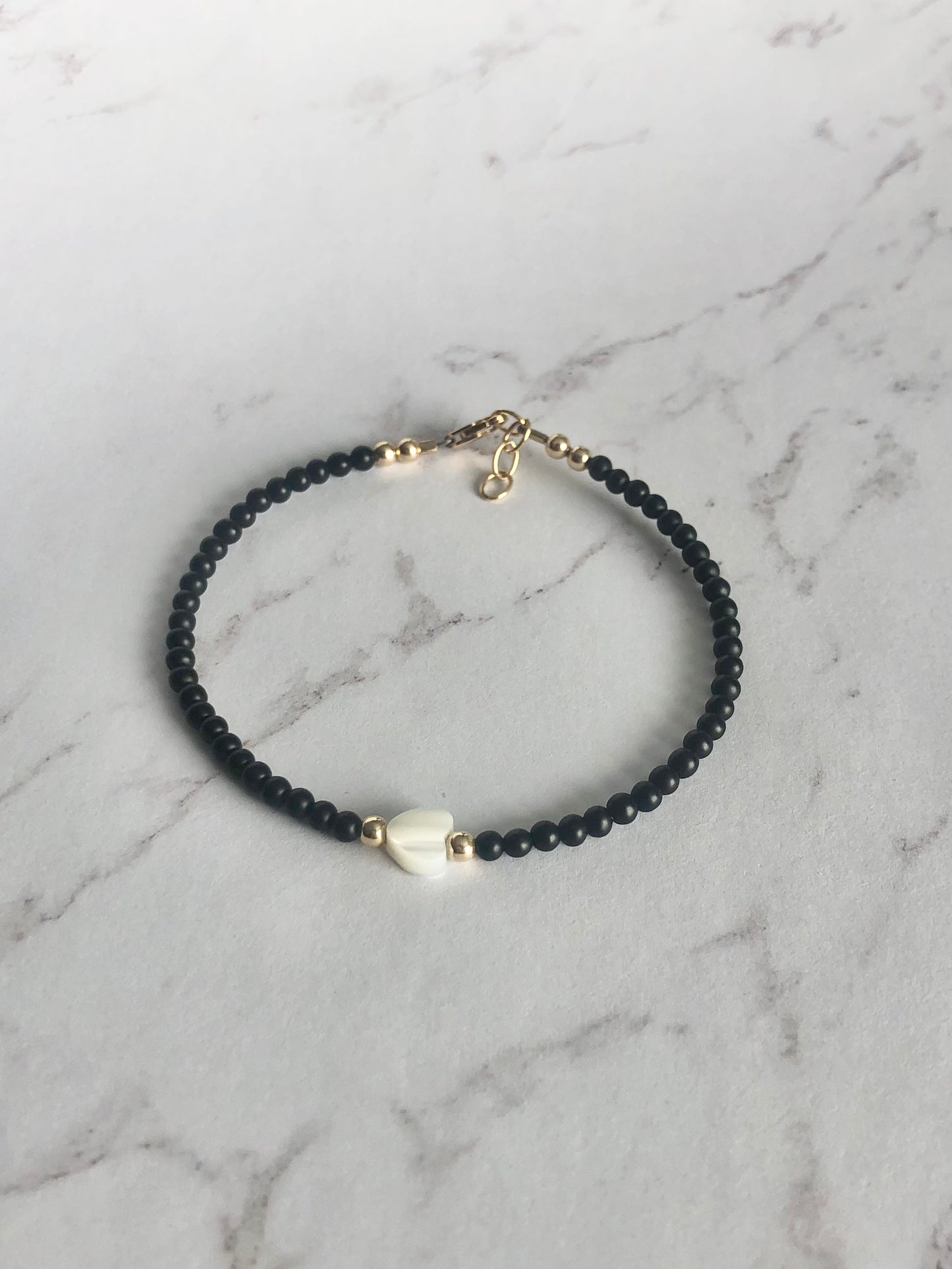 Solitaire Pearl Heart Bracelet.