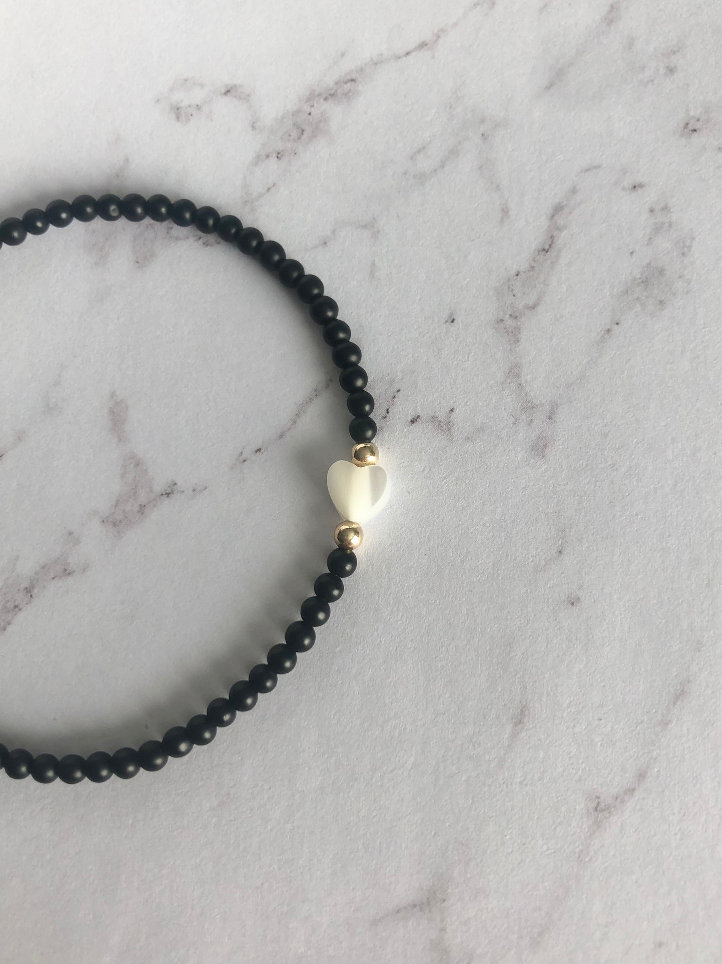 Solitaire Pearl Heart Bracelet.